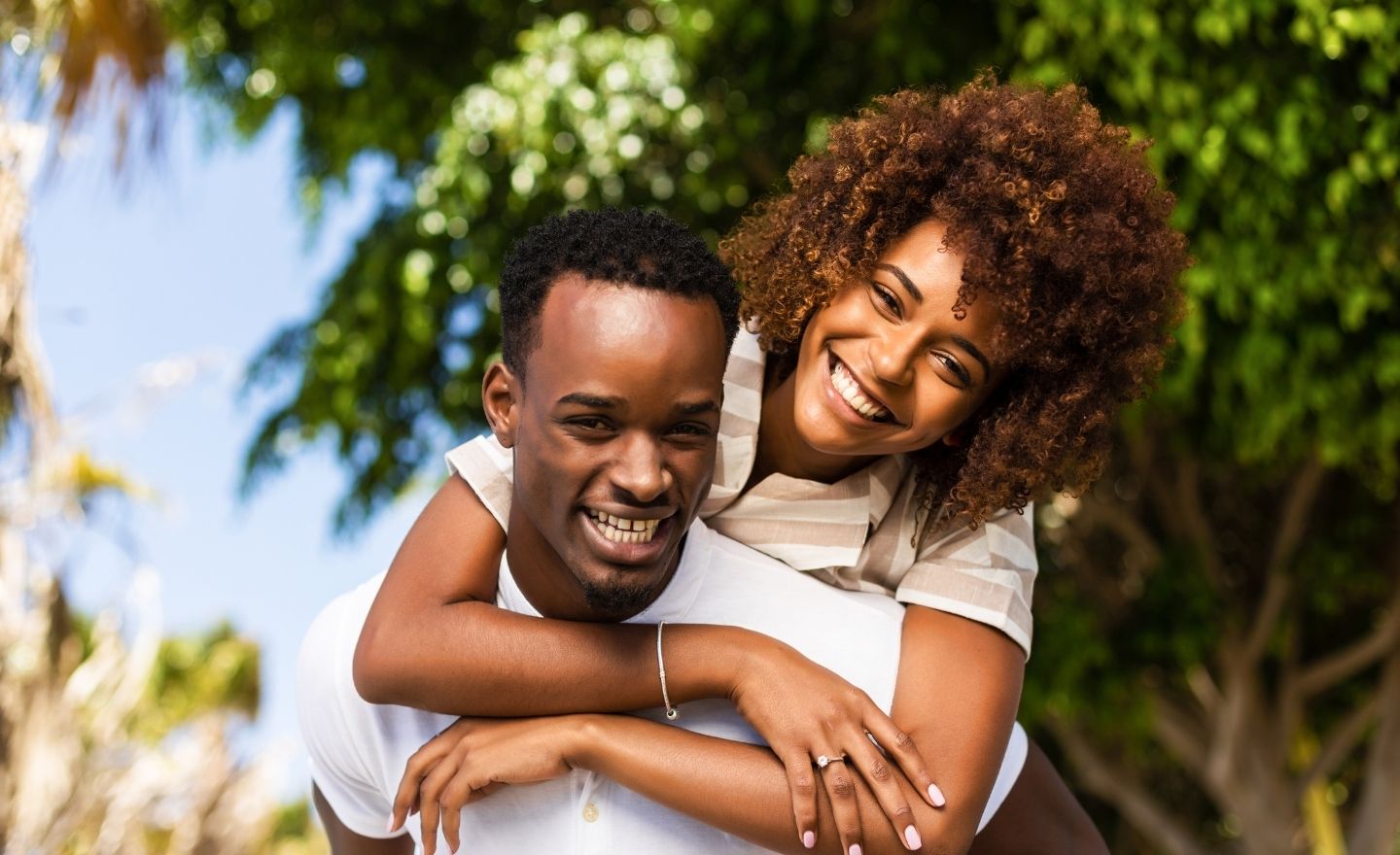 Happy couple in the black community enabled to live life with autism or ADHD diagnosis.