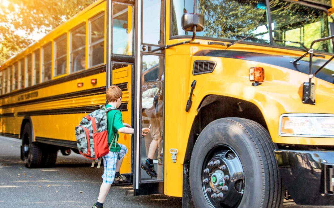 Child getting on a school bus – learning how to advocate for child with autism